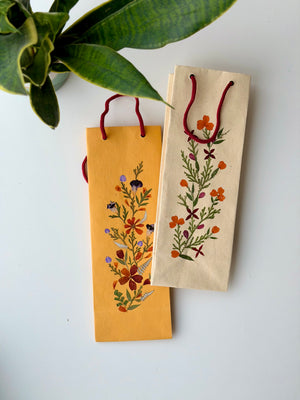 Wine gift bag with real pressed Himalayan flowers by Vaarsa London