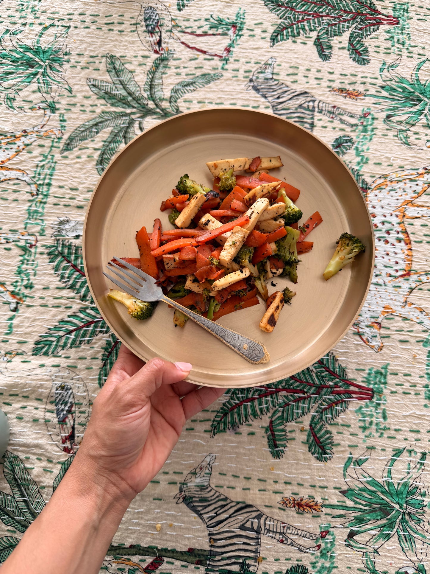 Close-up of handcrafted kansa first plate