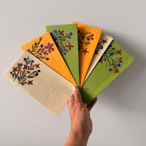 Shagun envelopes in mixed colours with real pressed flowers on handmade paper
