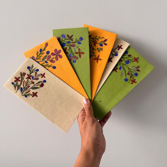 Shagun envelopes in mixed colours with real pressed flowers on handmade paper