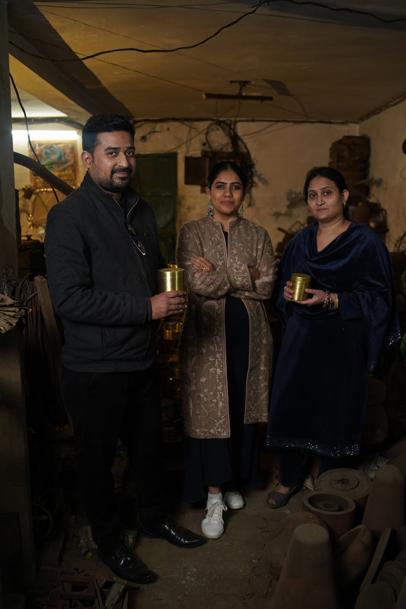 The Moradabad workshop team with finished brass jars