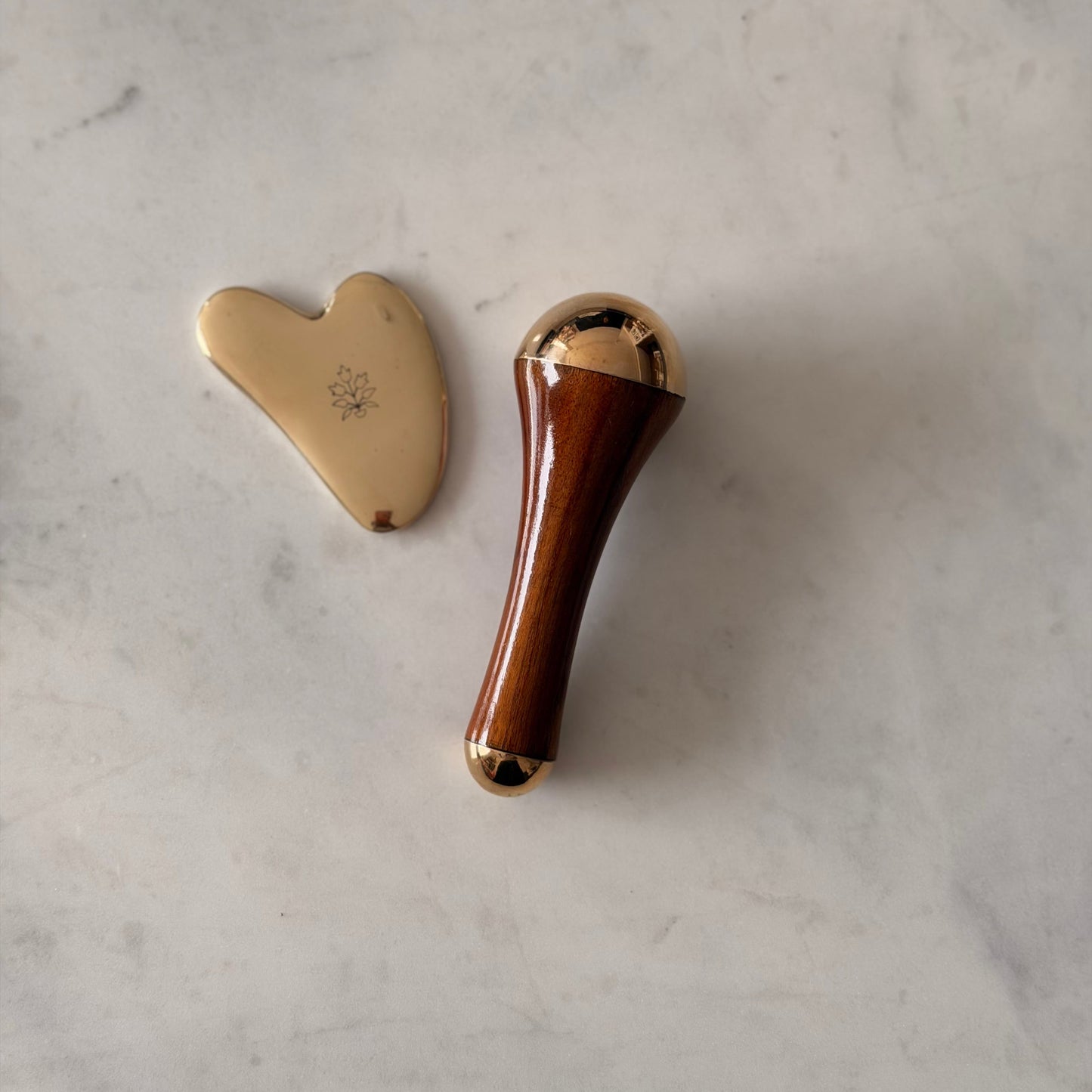 kansa-wand-teak-handle-ayurvedic-marma-facial-massager-vaarsa-london-gua-sha