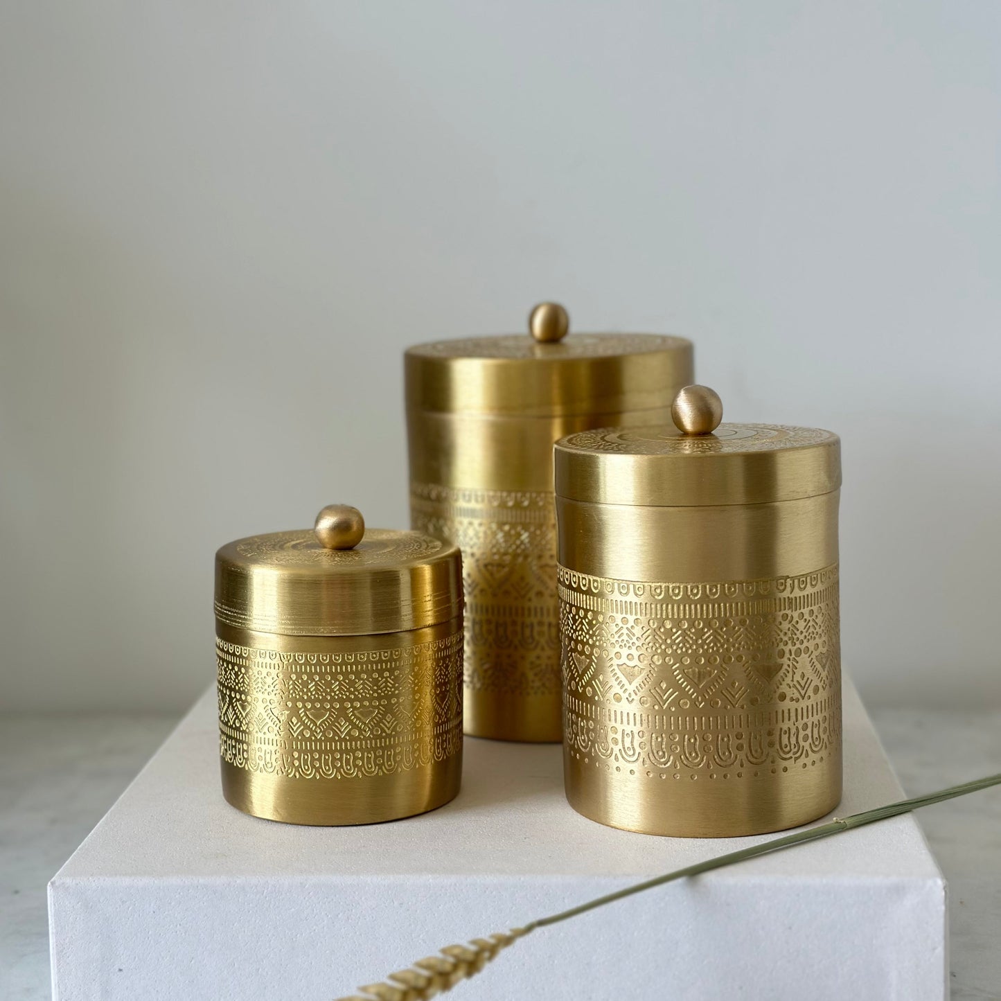Set of three handcrafted brass storage jars by Vaarsa London