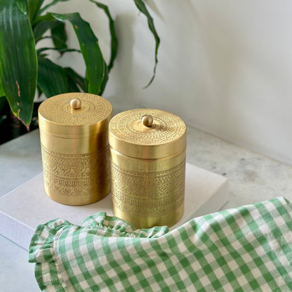 Two brass storage jars with decorative patterns, Vaarsa London